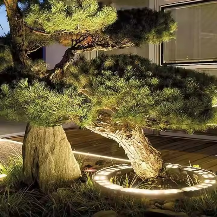 Élégant arbre extérieur mettant en lumière les projecteurs